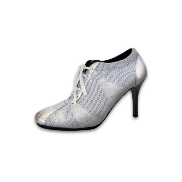 Art. 505 - Tela blanca y cuero plateado con glitter